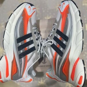 Adidas Adistar jellyfish Pharrell Williams 
White, Gray, and Orange Sneakers